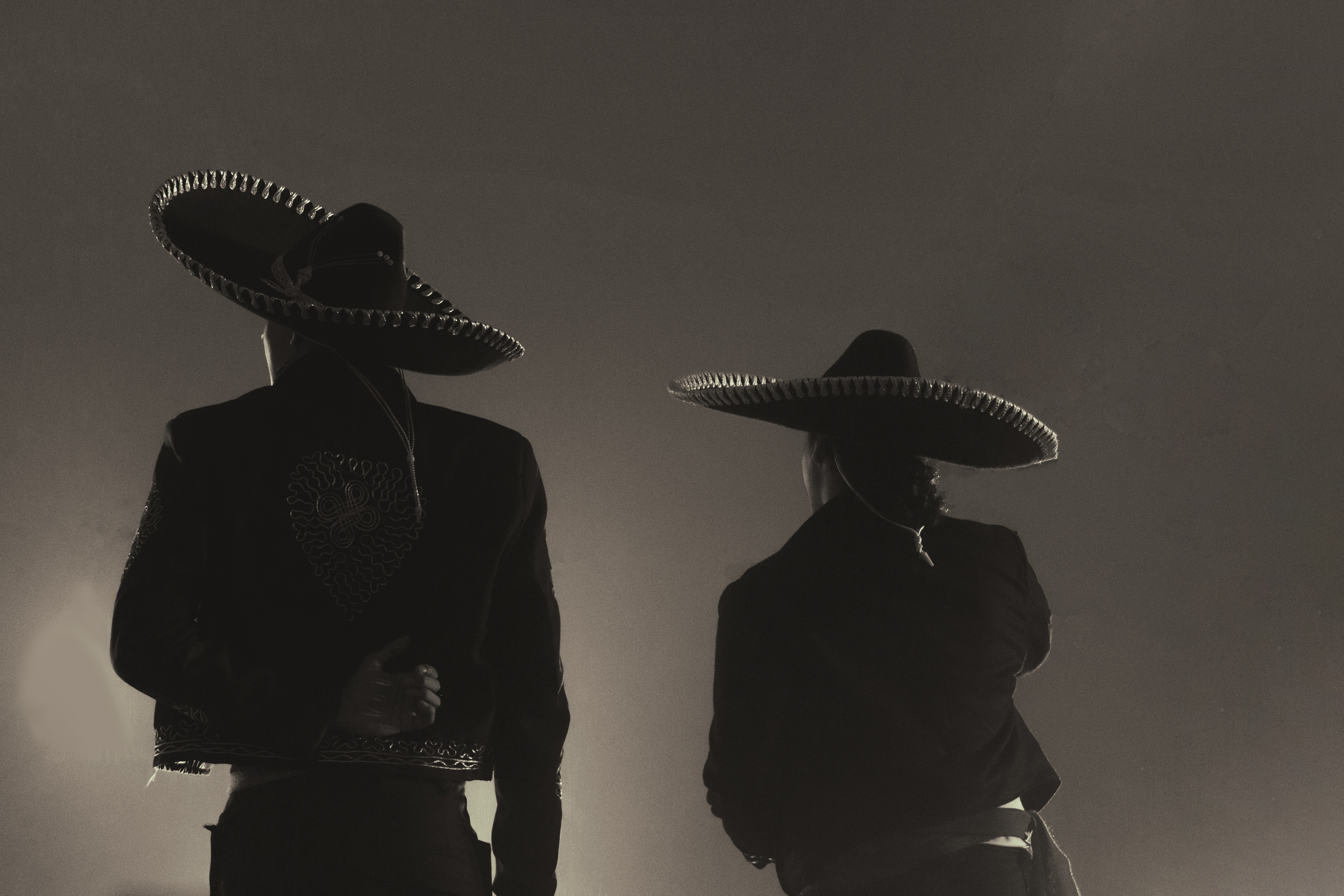 Black and white photo of an old fashioned mariachi band